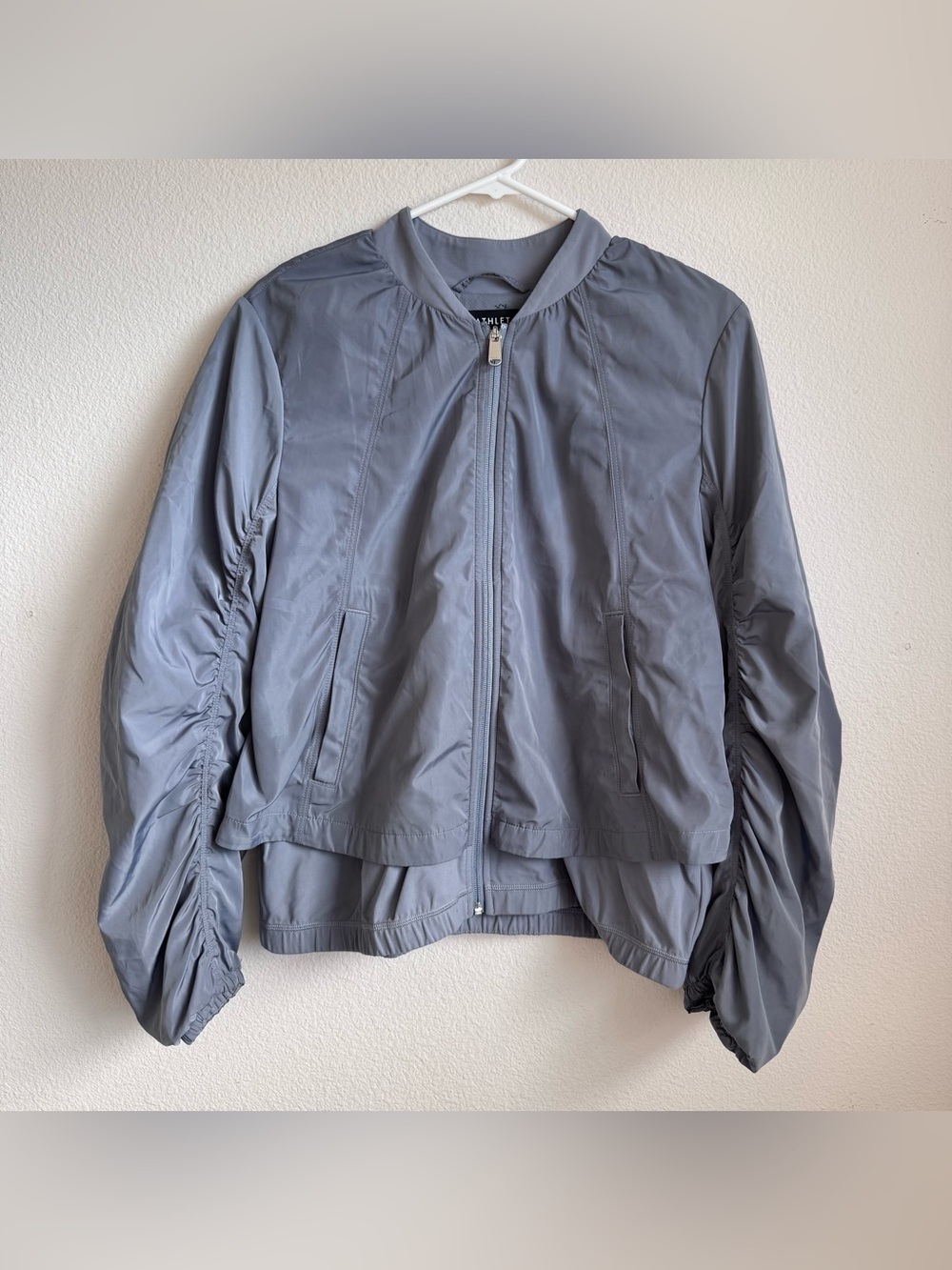 Athleta gray ruffle sleeve zip up wind breaker jacket size medium